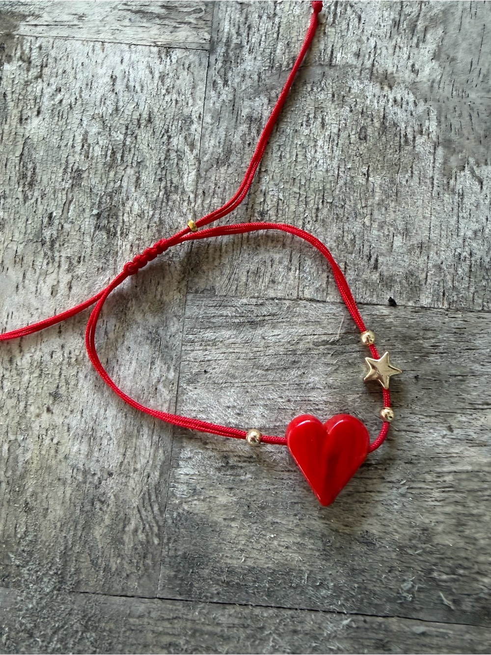 Red Heart Cord Bracelet with Gold Star Accent